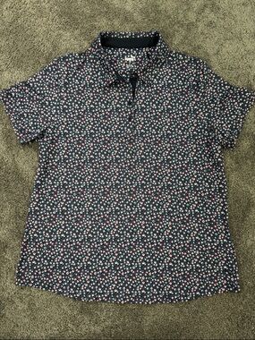 Puma Navy golf Polo with Pink & White Floral Print women’s Large UPF 40 NWT